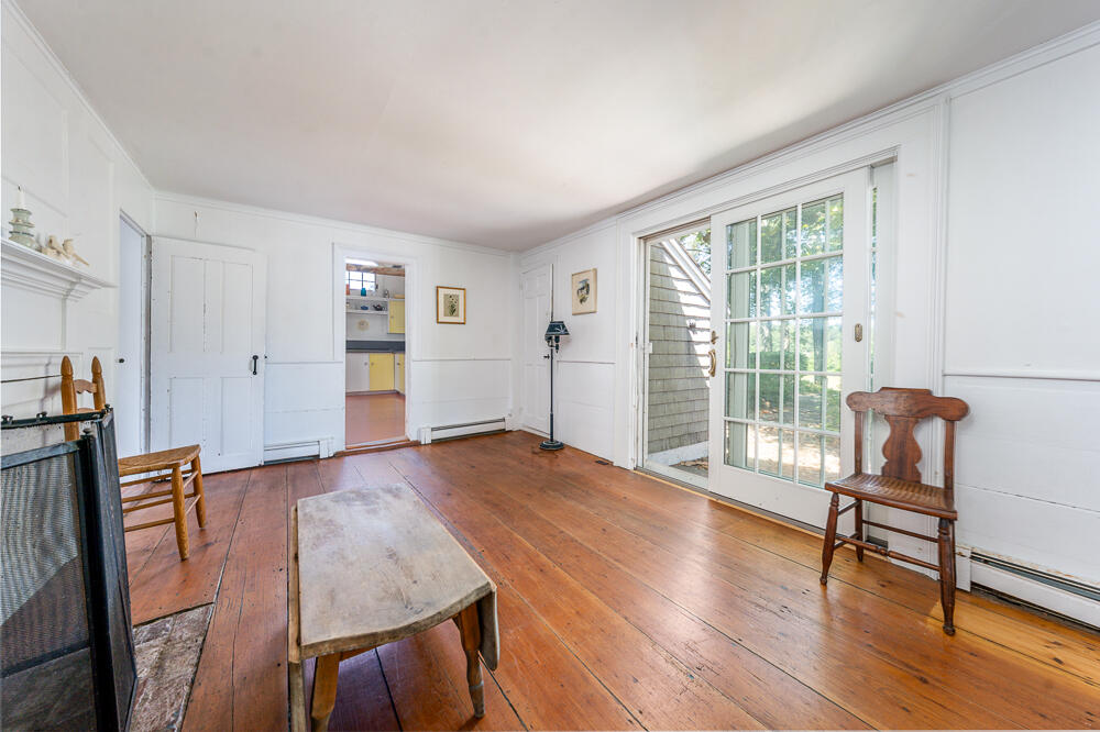 46 South Pamet Road Truro, MA 02666 - Photo 13 of 68 a view of a livingroom with furniture hardwood floor and a window