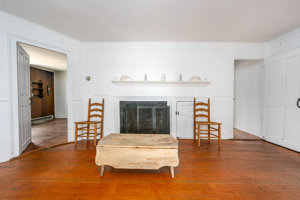46 South Pamet Road Truro, MA 02666 - Photo 14 of 68 a living room with furniture and a fireplace
