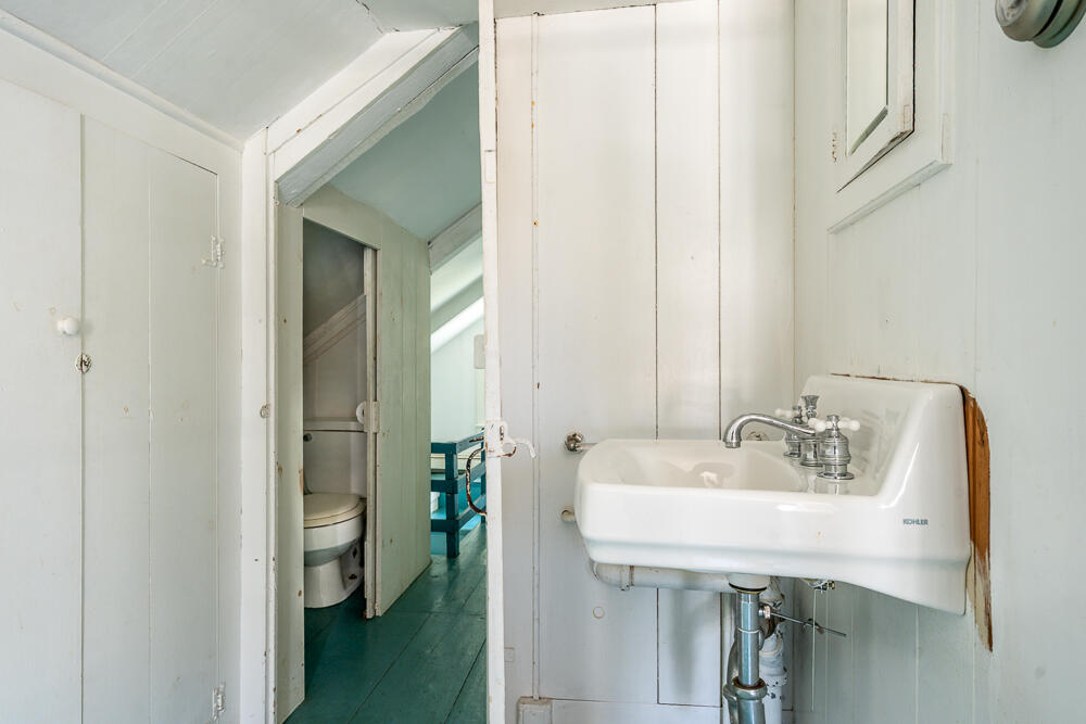 46 South Pamet Road Truro, MA 02666 - Photo 23 of 68 a bathroom with a sink and a mirror