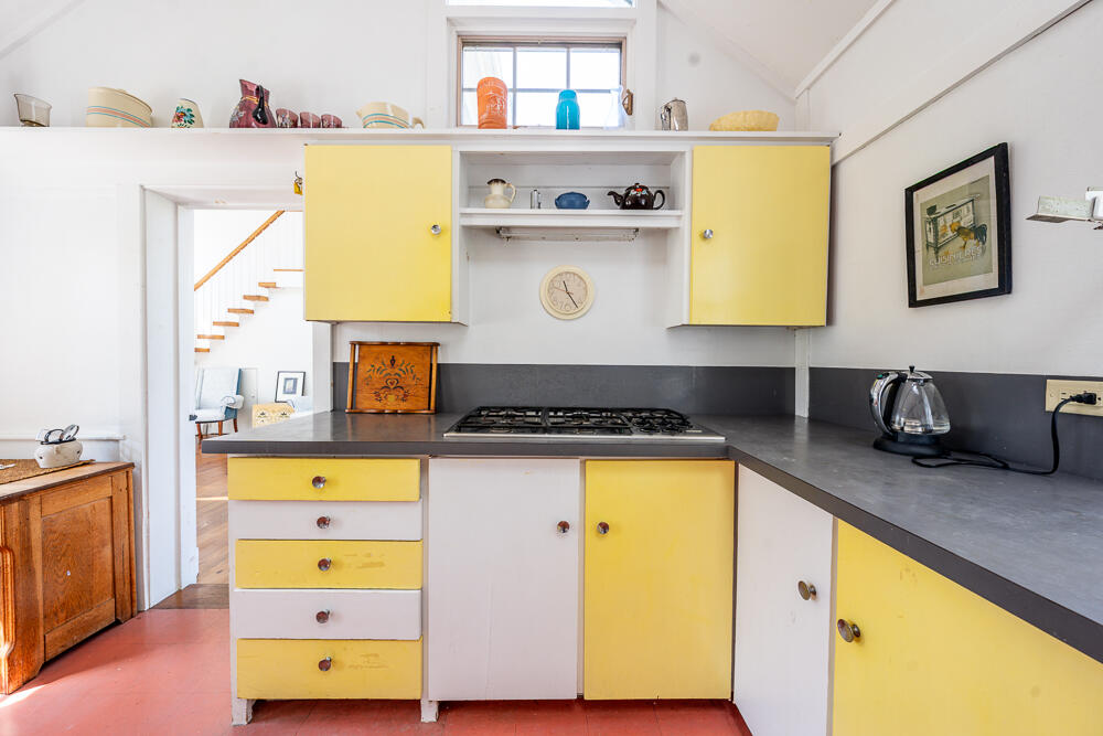 46 South Pamet Road Truro, MA 02666 - Photo 26 of 68 a view of a kitchen with a sink and a refrigerator