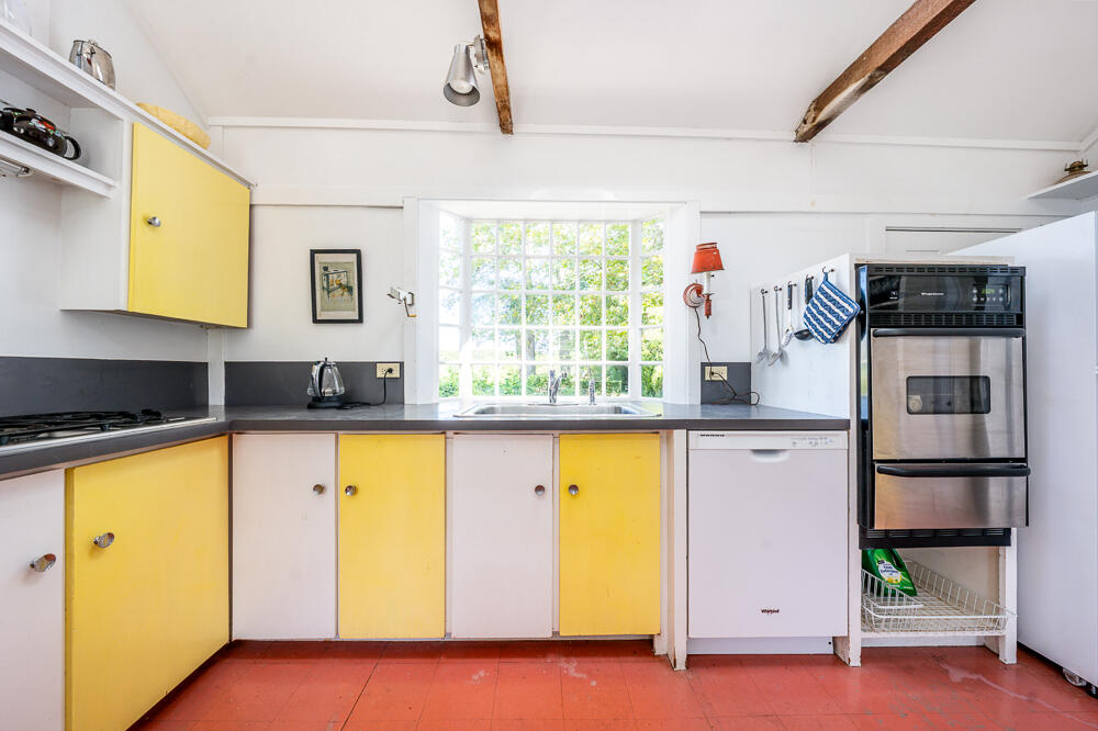 46 South Pamet Road Truro, MA 02666 - Photo 27 of 68 a kitchen with stainless steel appliances granite countertop a sink and a refrigerator