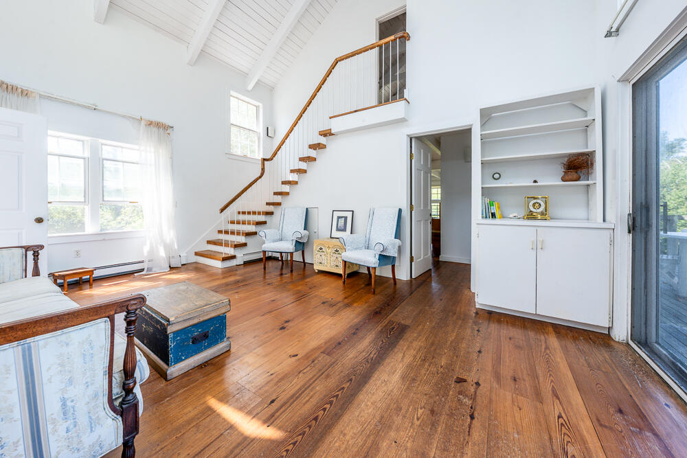 46 South Pamet Road Truro, MA 02666 - Photo 31 of 68 a room with wooden floor pool table and windows