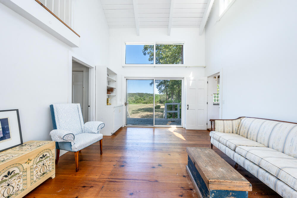 46 South Pamet Road Truro, MA 02666 - Photo 32 of 68 a living room with furniture and a flat screen tv