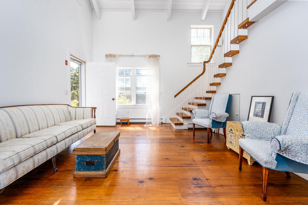 46 South Pamet Road Truro, MA 02666 - Photo 34 of 68 a living room with furniture and wooden floor