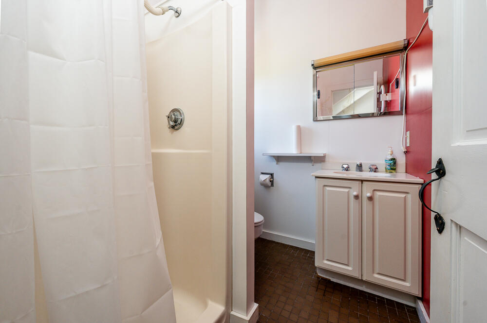 46 South Pamet Road Truro, MA 02666 - Photo 39 of 68 a bathroom with a sink a toilet and mirror