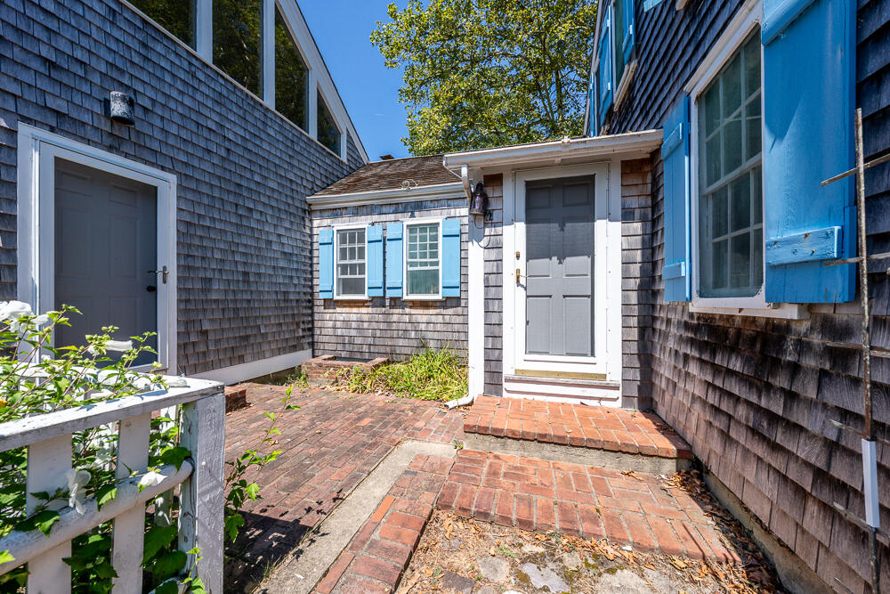 46 South Pamet Road Truro, MA 02666 - Photo 4 of 68 a view of a house with a small yard and wooden floor and fence