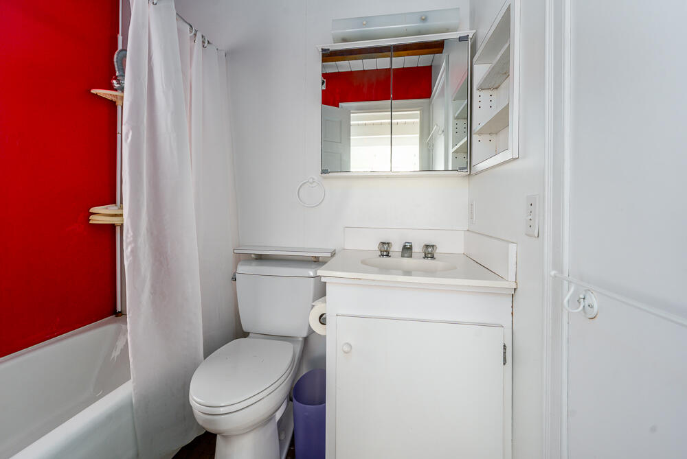 46 South Pamet Road Truro, MA 02666 - Photo 44 of 68 a bathroom with a sink toilet and window