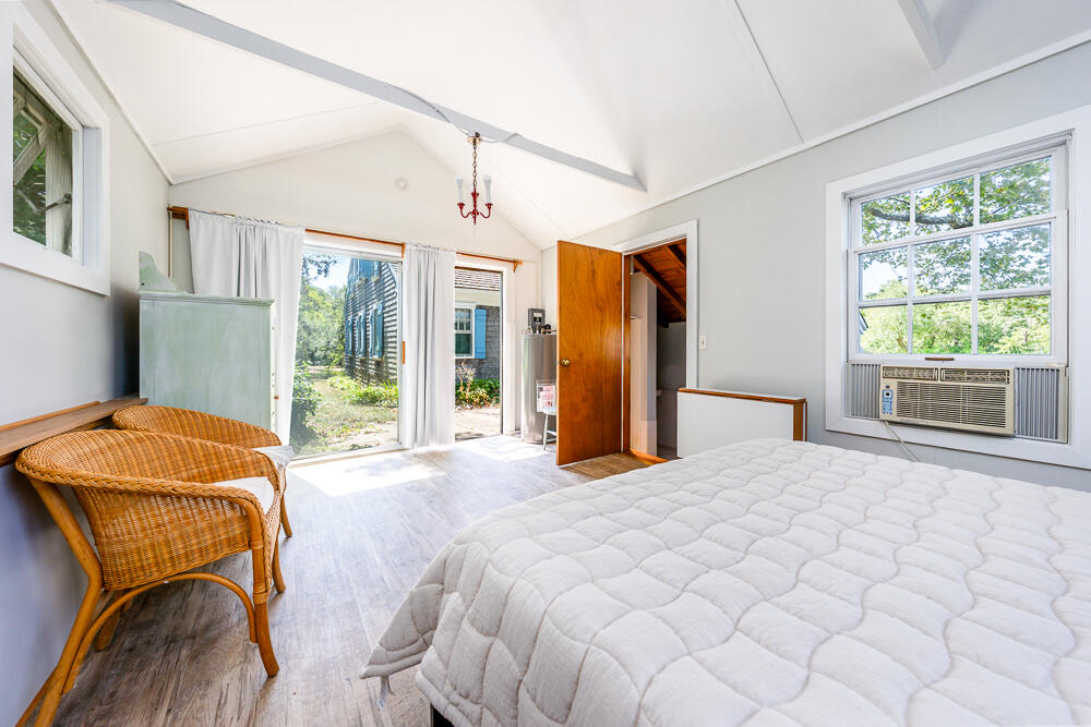 46 South Pamet Road Truro, MA 02666 - Photo 50 of 68 a bedroom with a bed closet and window