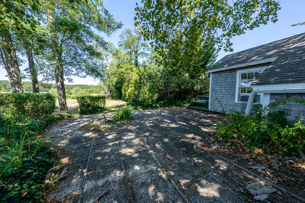 46 South Pamet Road Truro, MA 02666 - Photo 51 of 68 a view of a house with a yard