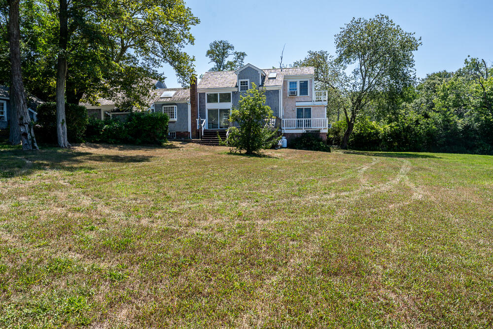 46 South Pamet Road Truro, MA 02666 - Photo 53 of 68 a front view of a house with a yard