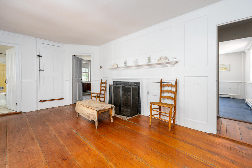 46 South Pamet Road Truro, MA 02666 - Photo 10 of 68 a living room with furniture and a fireplace