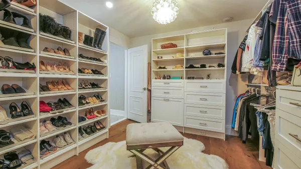 a bathroom with a sink and a large window