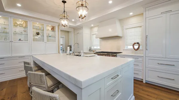 a bathroom with a double vanity sink toilet and shower