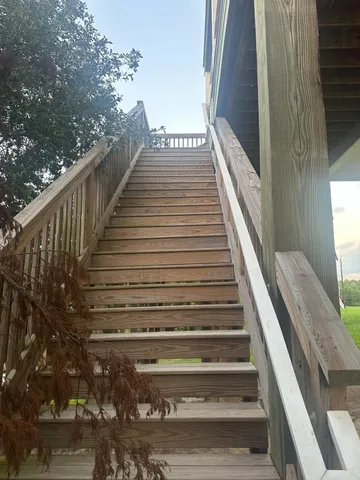 a view of a lake with a house in the background