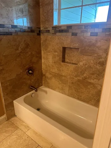a bathroom with a bathtub