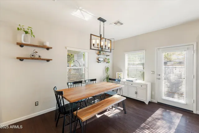 a bedroom with bed and a window