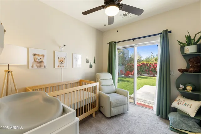 a bedroom with furniture and a window