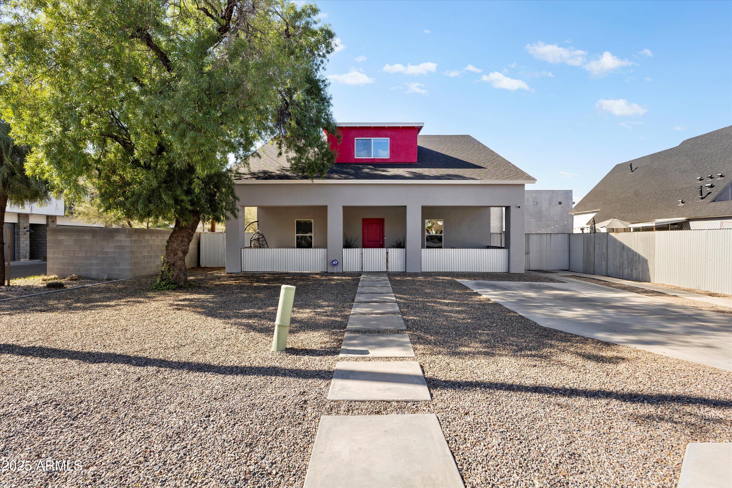 3930 North 30th Street Phoenix, AZ 85016 - Photo 2 of 40 a front view of a house with street