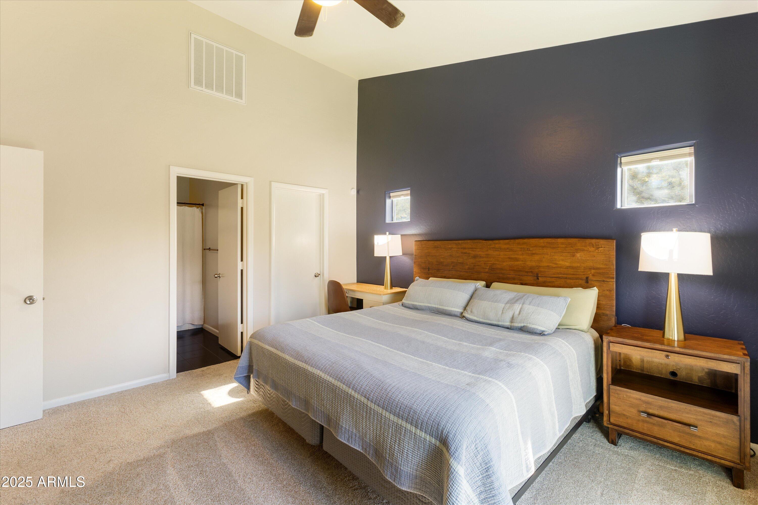 3930 North 30th Street Phoenix, AZ 85016 - Photo 21 of 40 a bedroom with a bed and a lamp