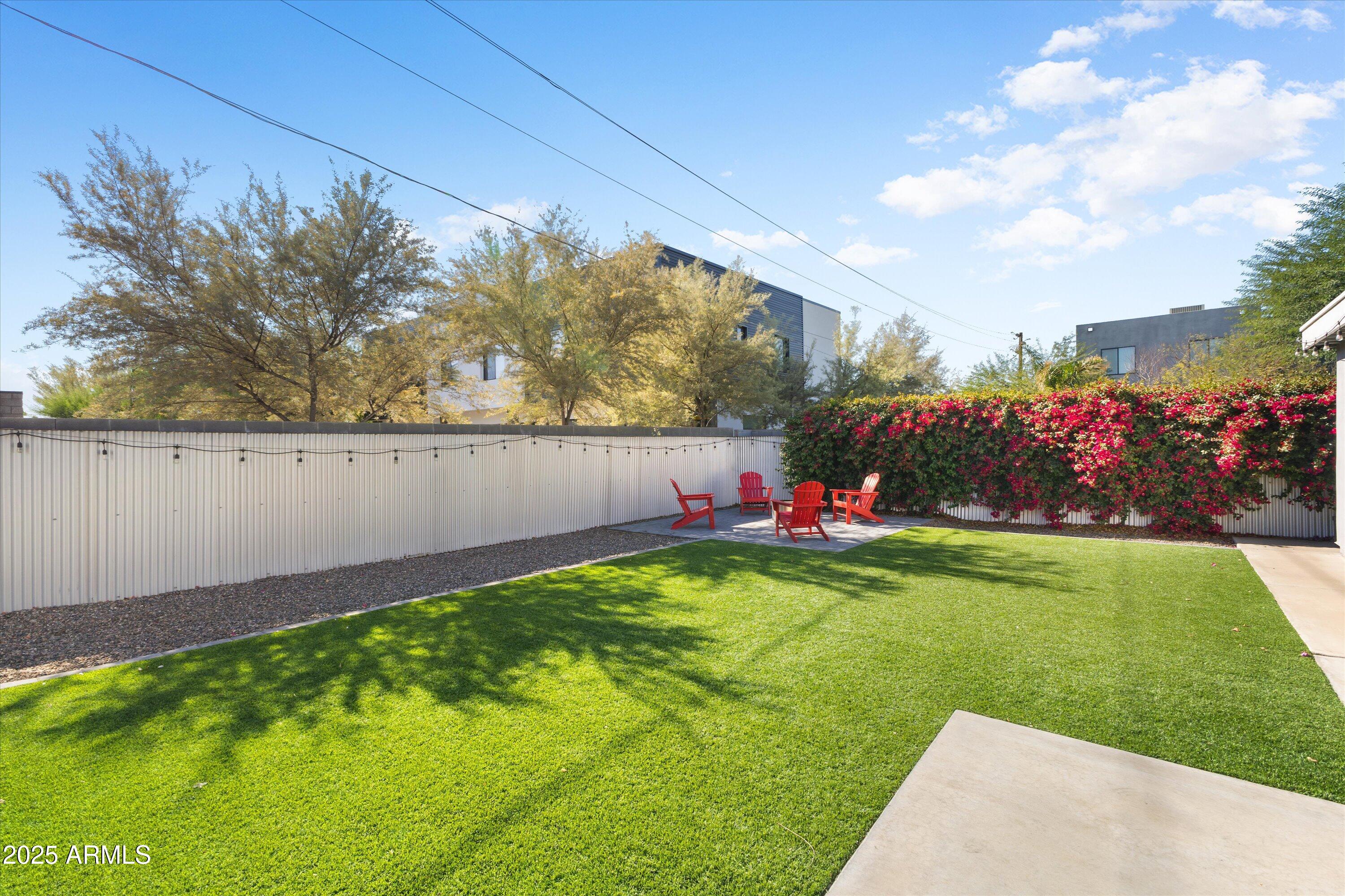 3930 North 30th Street Phoenix, AZ 85016 - Photo 32 of 40 a view of yard with swimming pool and green space