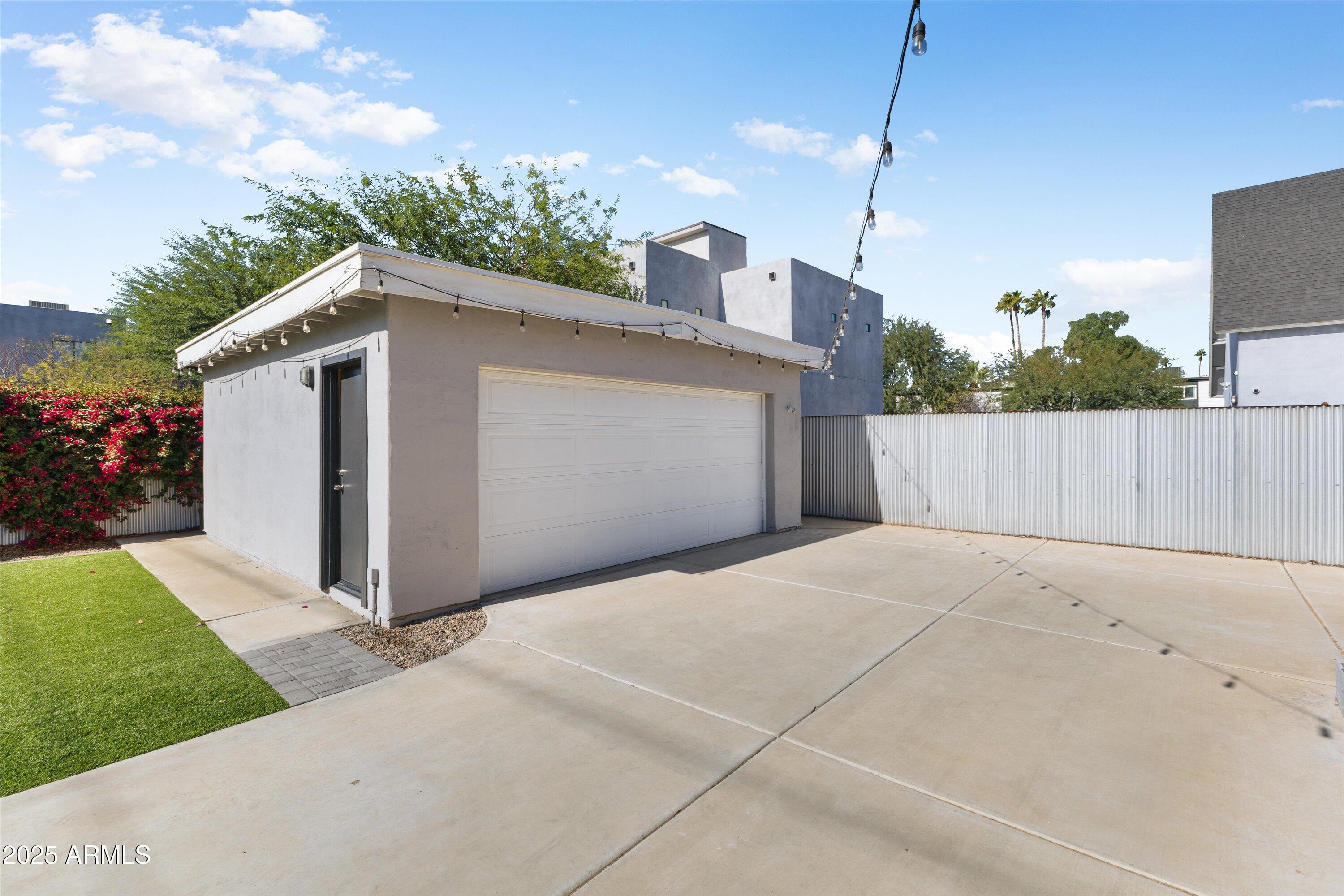 3930 North 30th Street Phoenix, AZ 85016 - Photo 35 of 40 a view of a house with a backyard and plants
