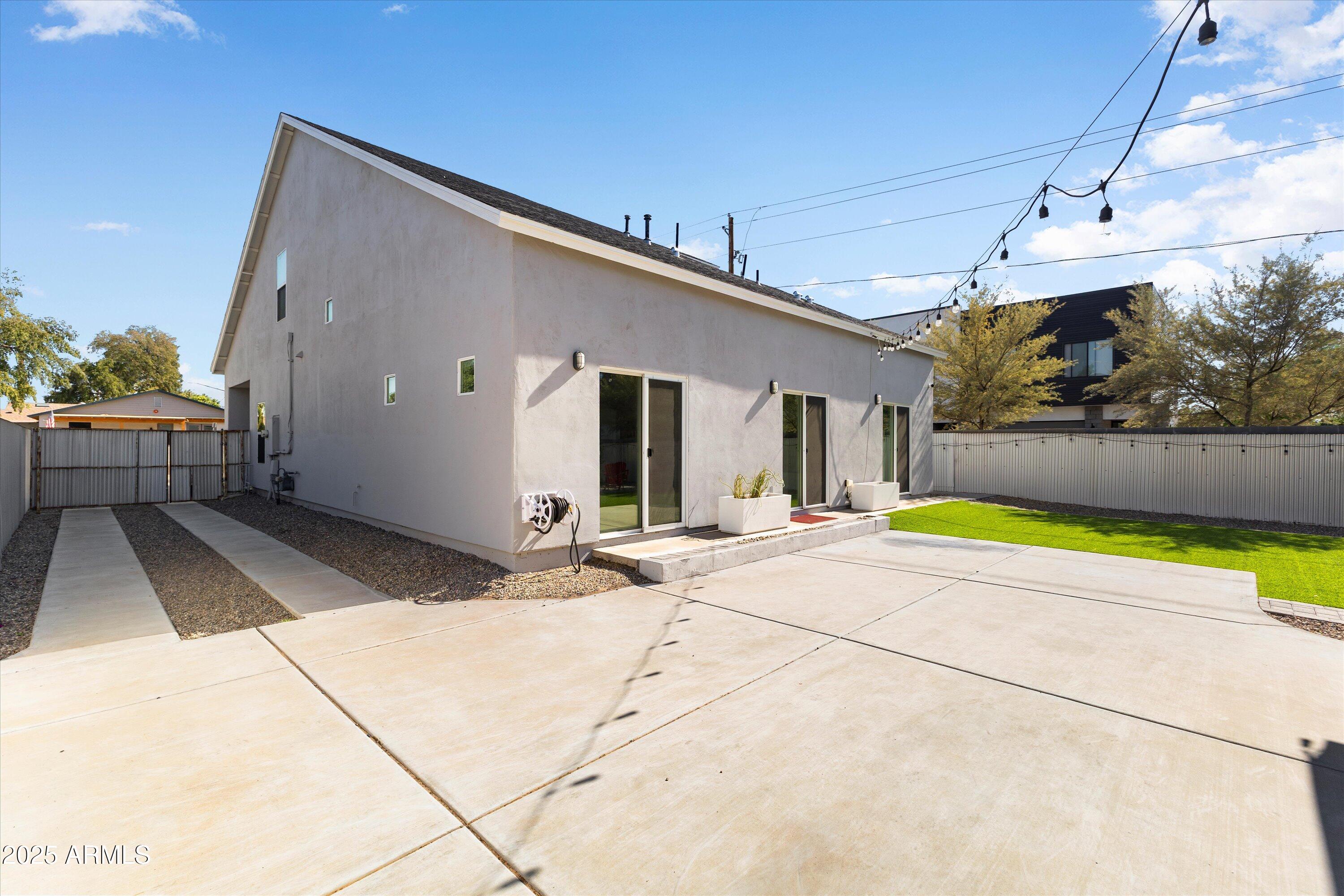 3930 North 30th Street Phoenix, AZ 85016 - Photo 39 of 40 a view of a house with a backyard and swimming pool