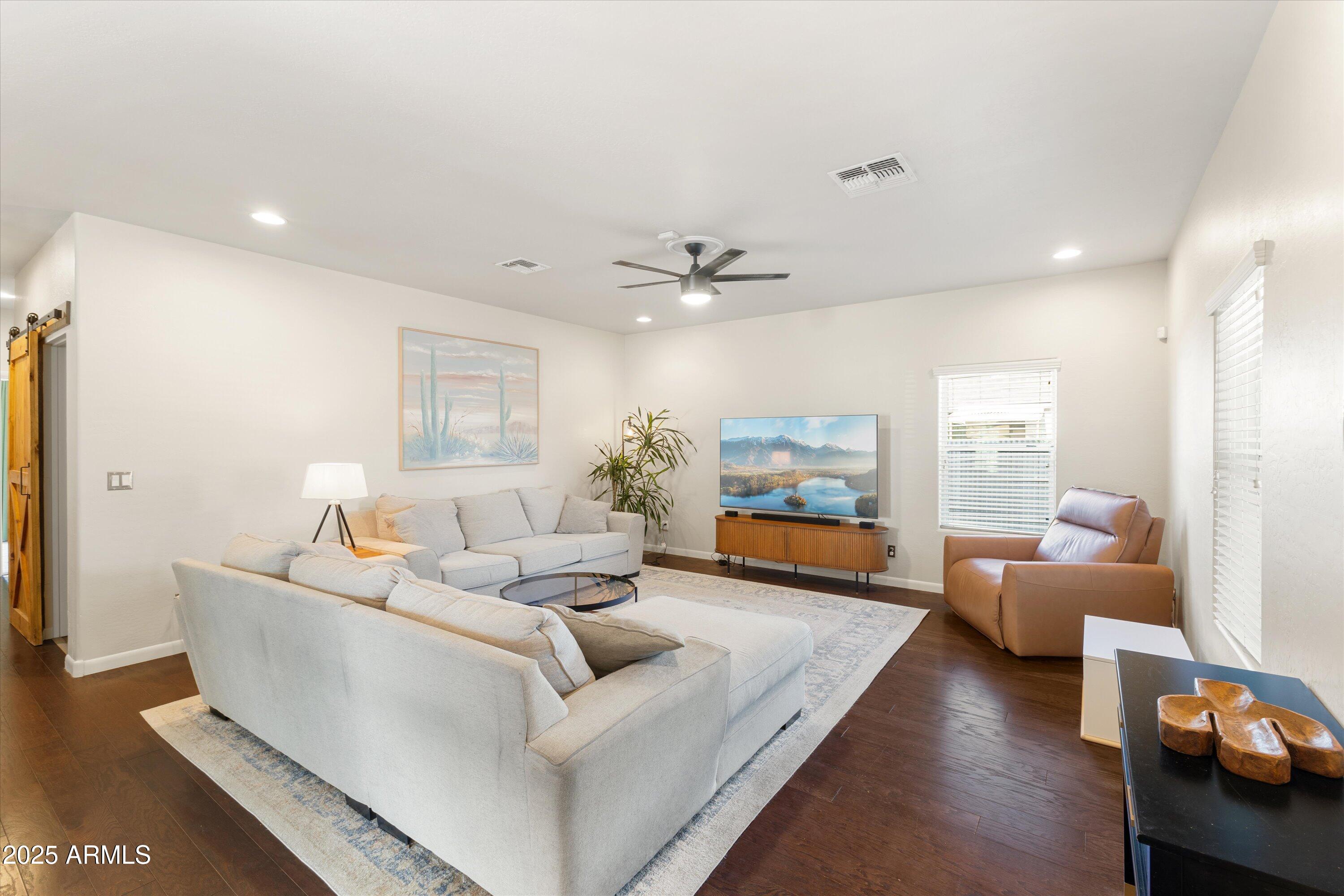 3930 North 30th Street Phoenix, AZ 85016 - Photo 8 of 40 a living room with furniture and a wooden floor