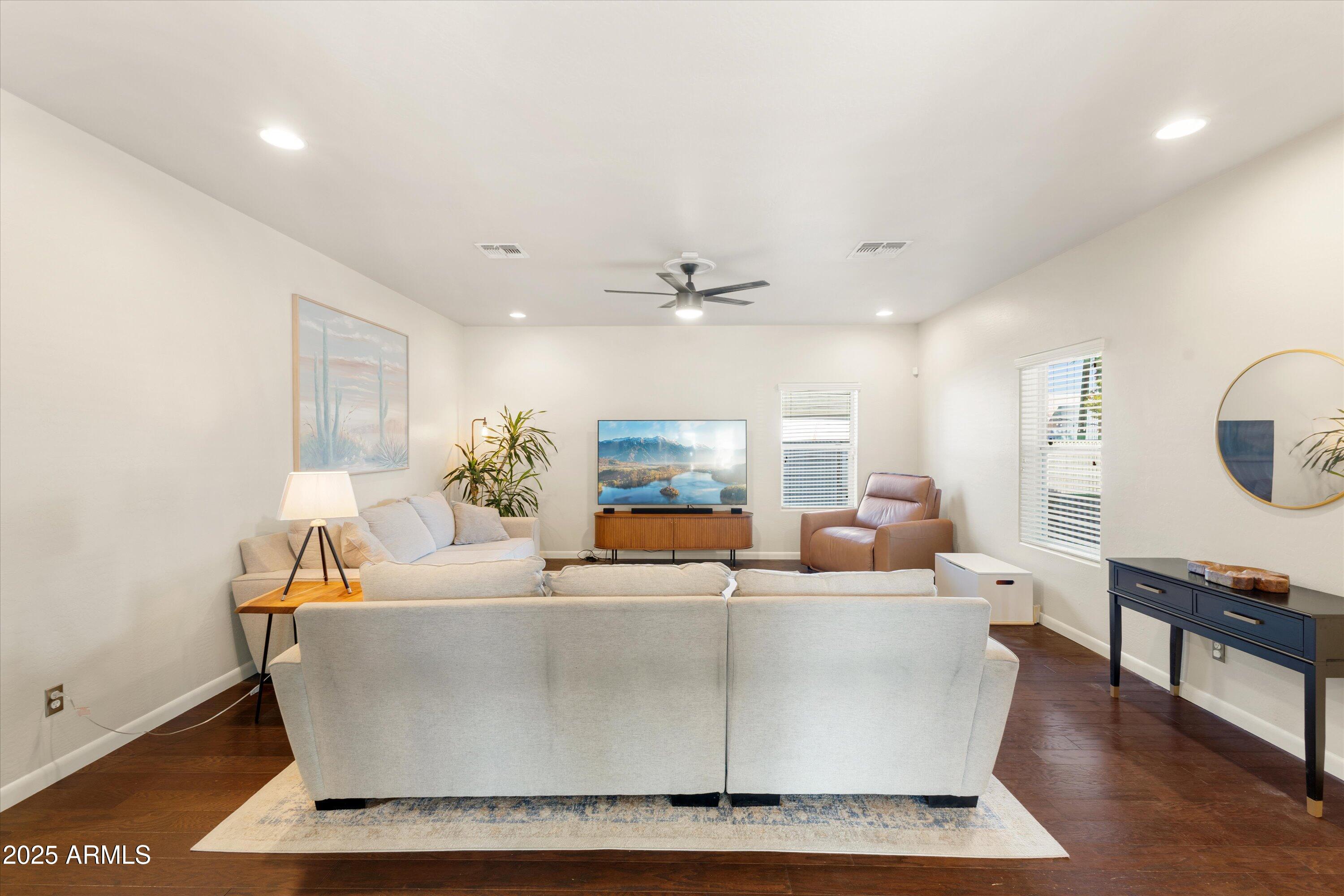 3930 North 30th Street Phoenix, AZ 85016 - Photo 10 of 40 a living room with large window and a table