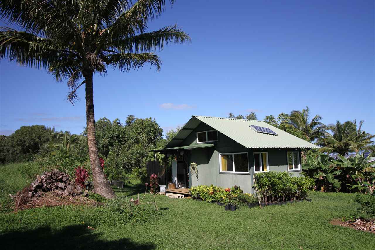 434 Hoolawa Road Haiku, HI 96708 - Photo 22 of 22 a front view of a house with a garden