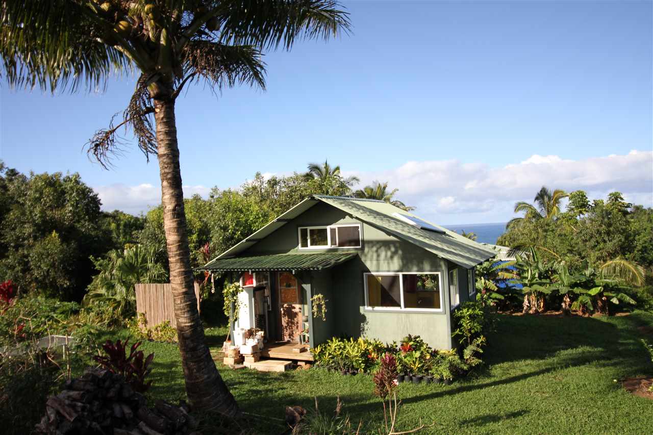 434 Hoolawa Road Haiku, HI 96708 - Photo 6 of 22 a front view of house with a garden