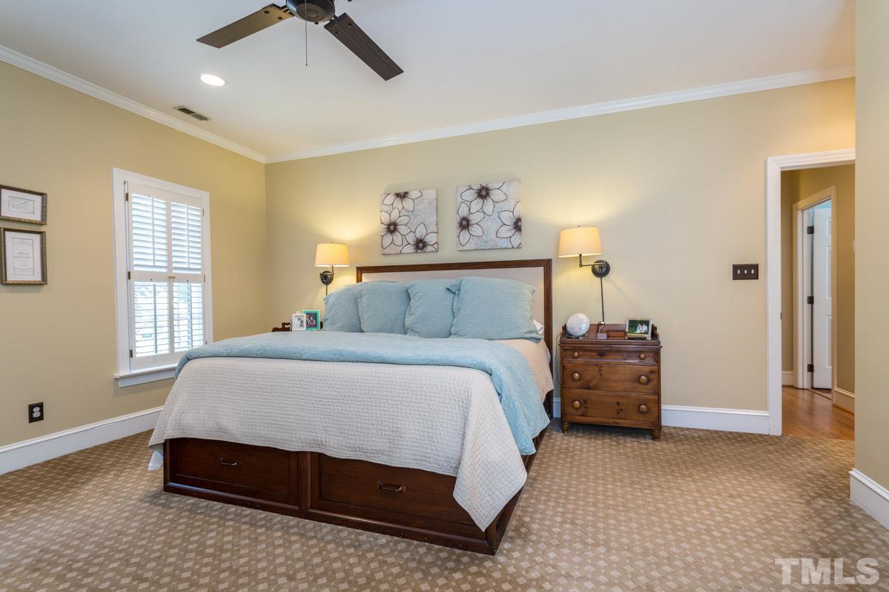 2206 Oxford Road Raleigh, NC 27608 - Photo 14 of 25 a bedroom with a bed and window