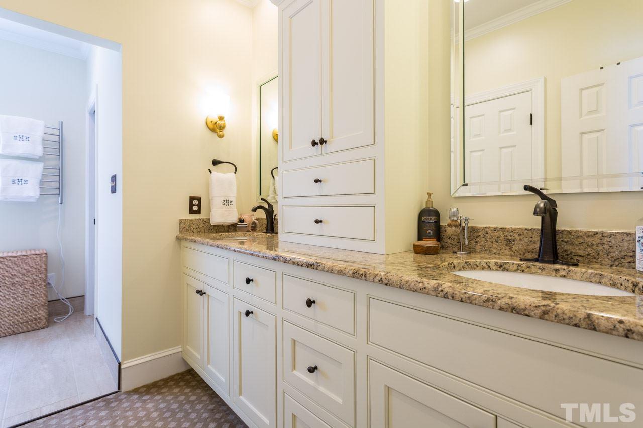 2206 Oxford Road Raleigh, NC 27608 - Photo 15 of 25 a bathroom with a granite countertop sink and a mirror