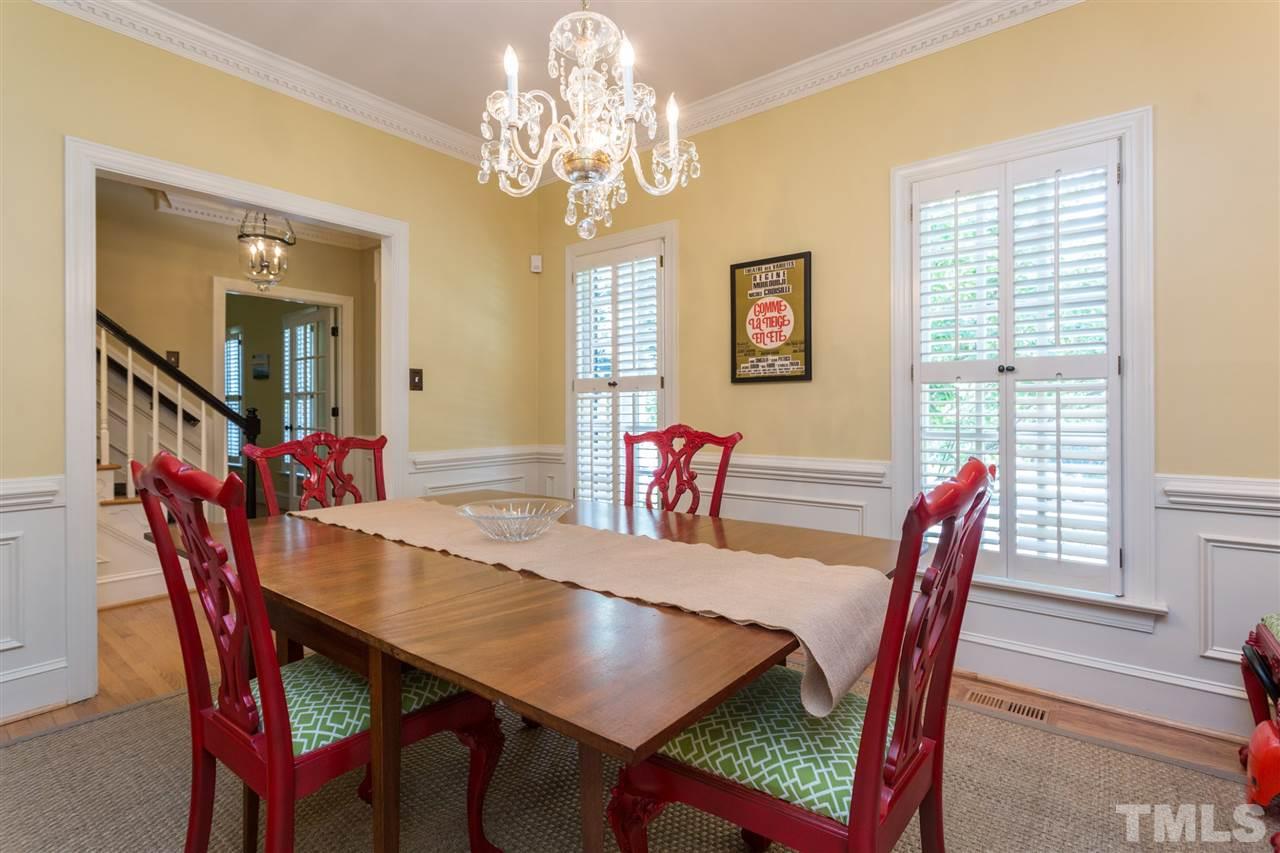 2206 Oxford Road Raleigh, NC 27608 - Photo 3 of 25 a view of a dining room with furniture window and wooden floor