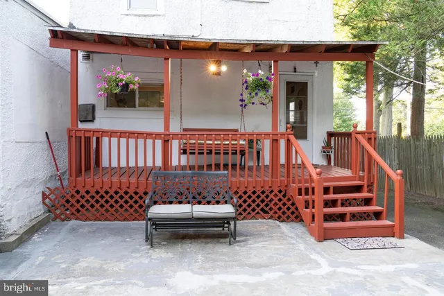 a view of a chairs setting in the balcony