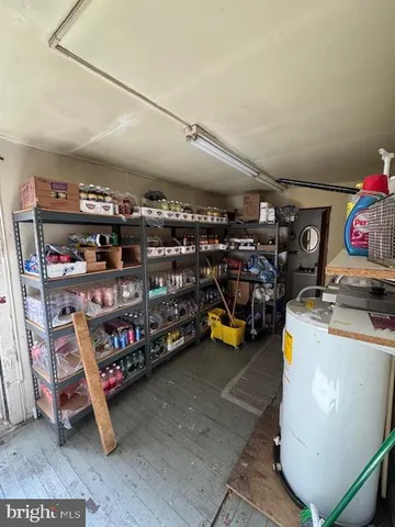 a view of a storage room with racks
