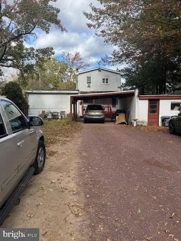 a view of car parked in front of house