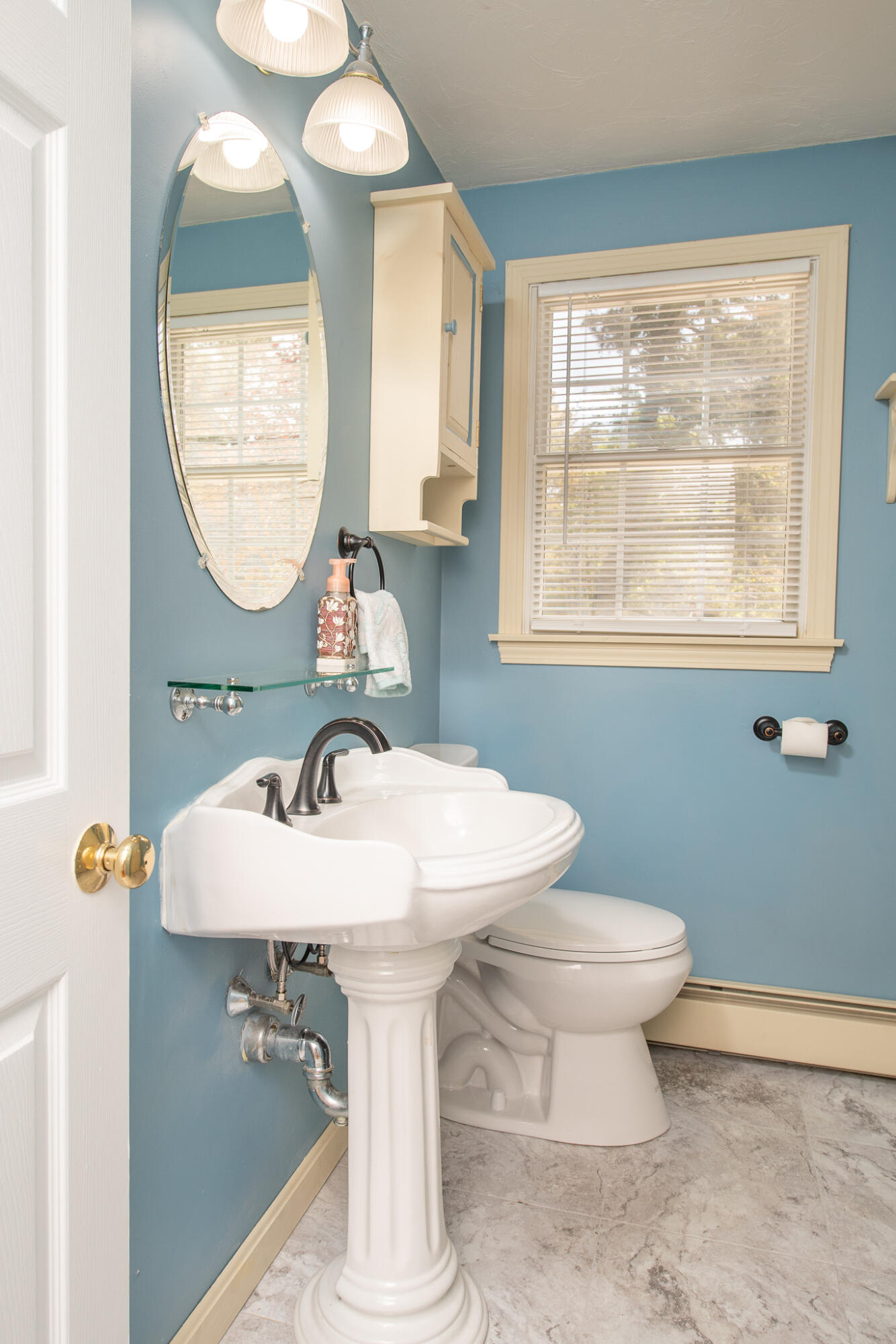 8 Yachtsman Circle Mashpee, MA 02649 - Photo 15 of 56 a bathroom with a sink a toilet and a mirror