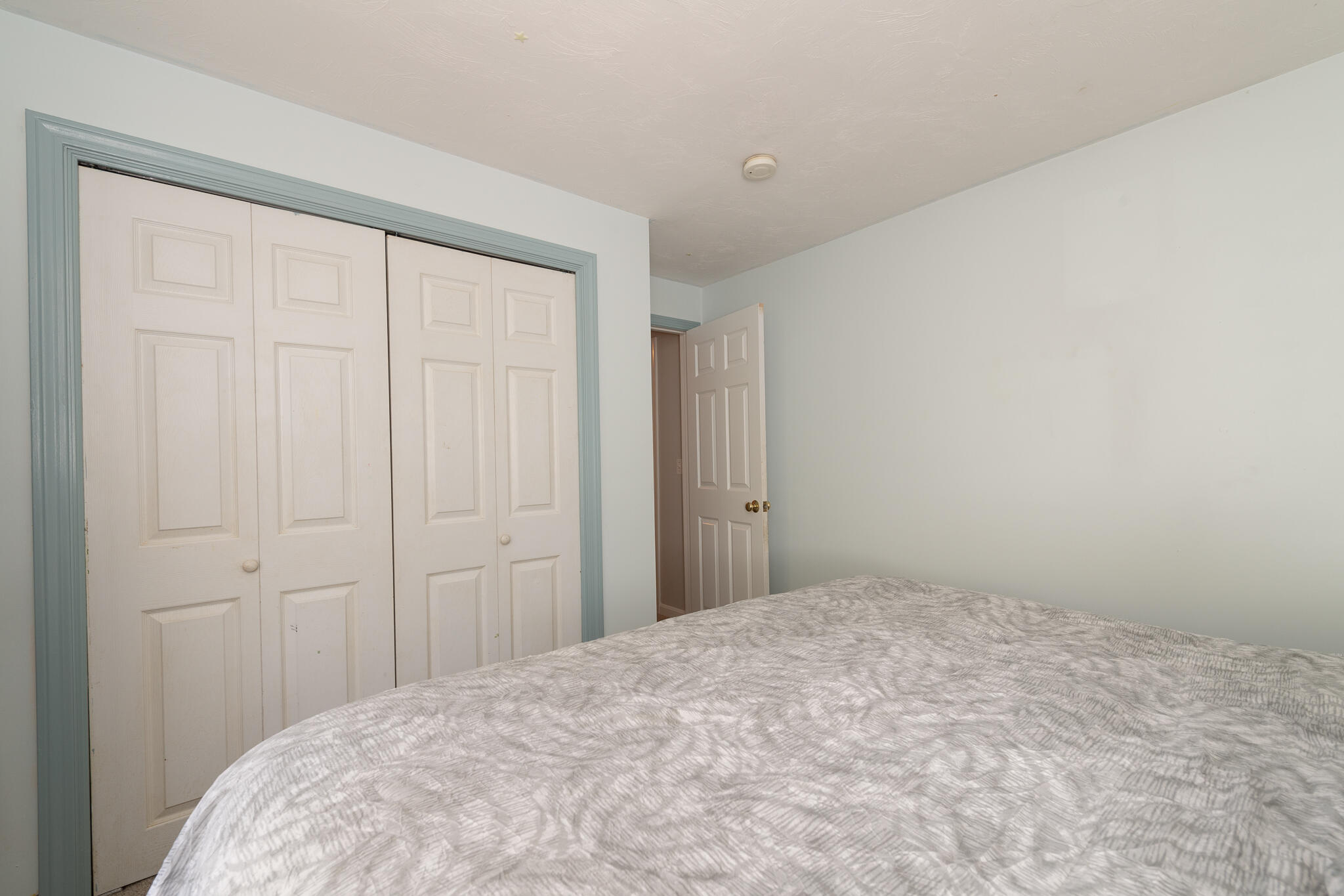 8 Yachtsman Circle Mashpee, MA 02649 - Photo 24 of 56 a bedroom with a bed and a window