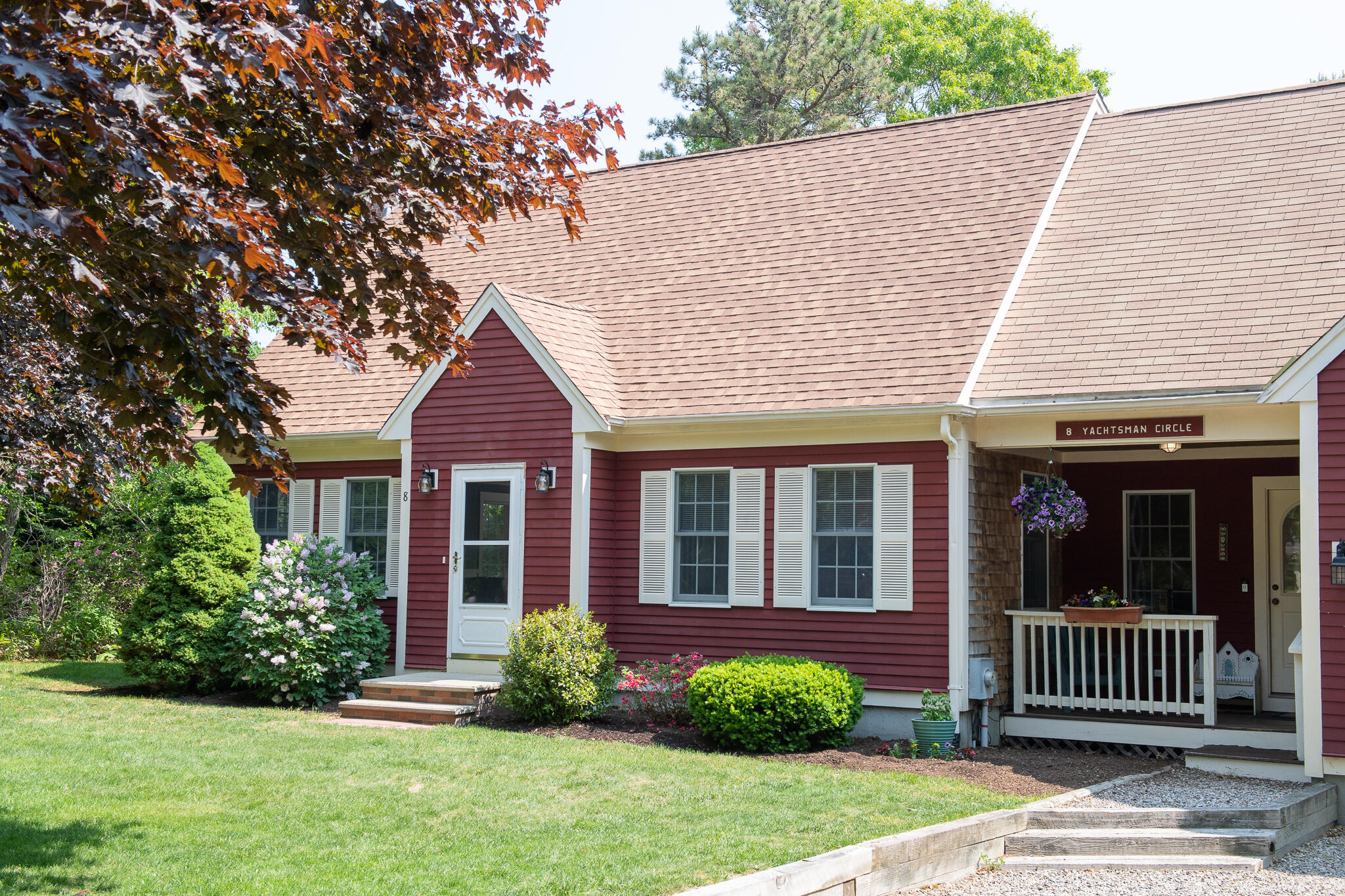 8 Yachtsman Circle Mashpee, MA 02649 - Photo 33 of 56 front view of a house with a yard