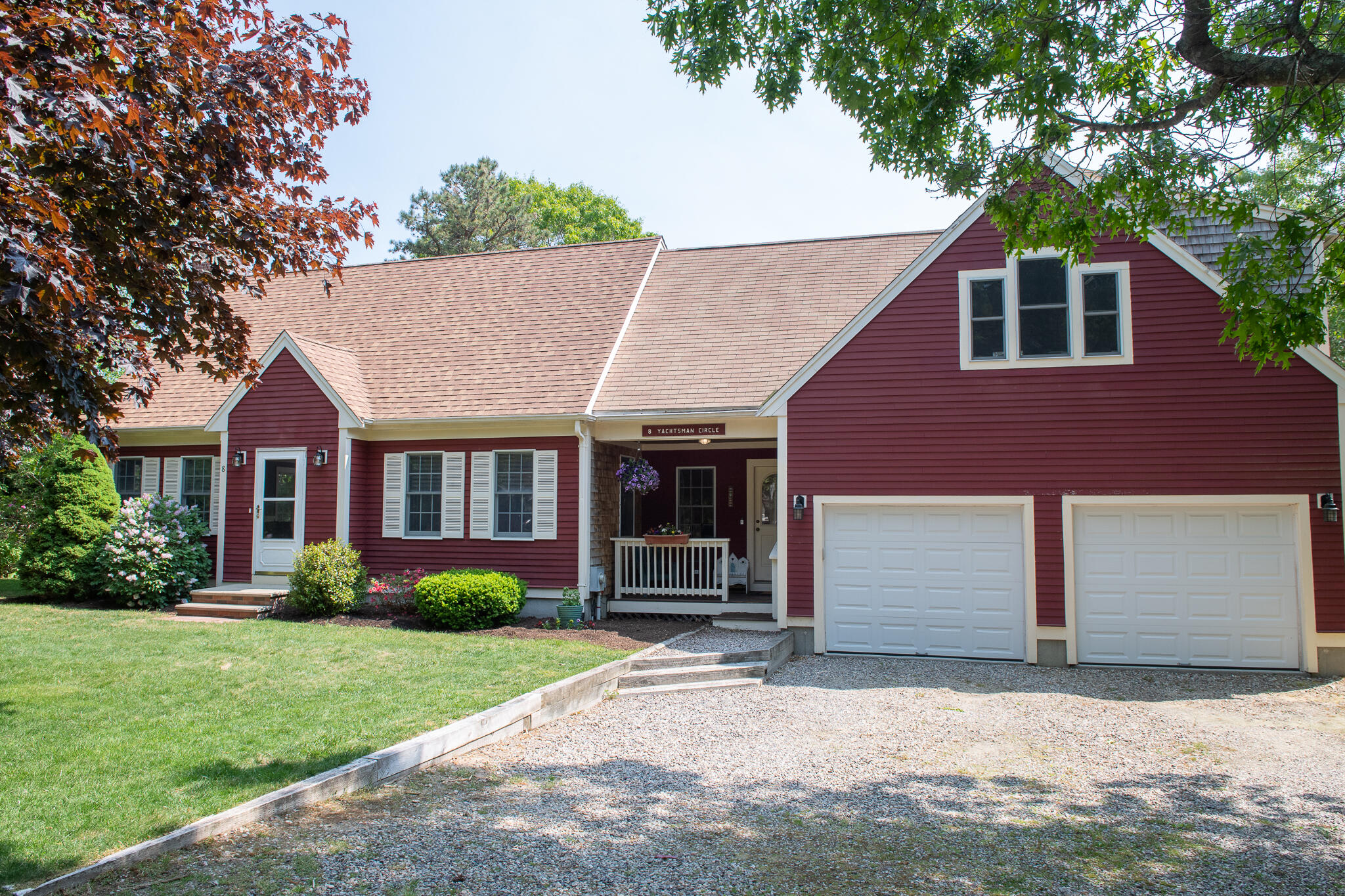 8 Yachtsman Circle Mashpee, MA 02649 - Photo 35 of 56 front view of a house with a yard