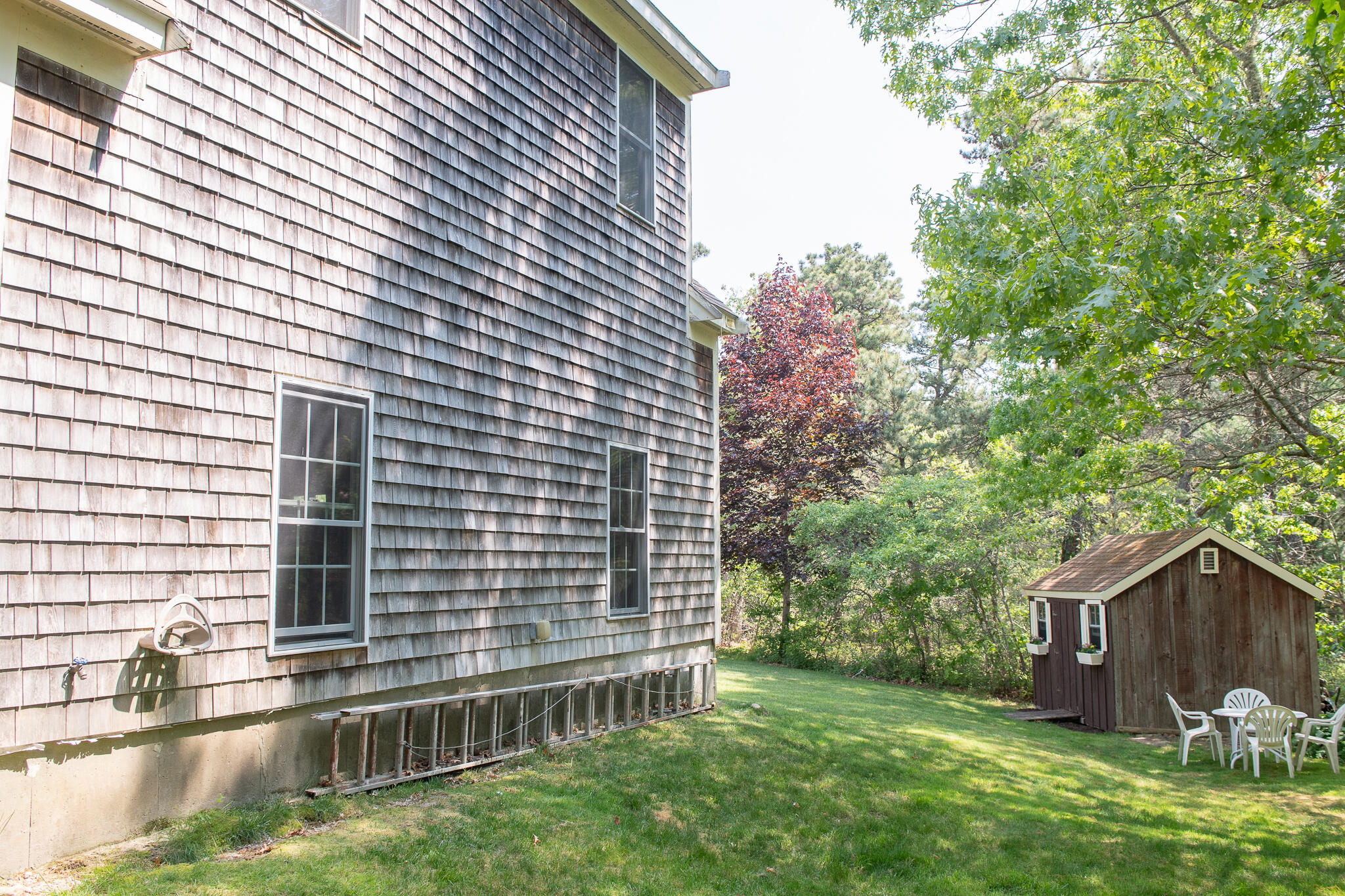 8 Yachtsman Circle Mashpee, MA 02649 - Photo 37 of 56 a view of backyard with garden