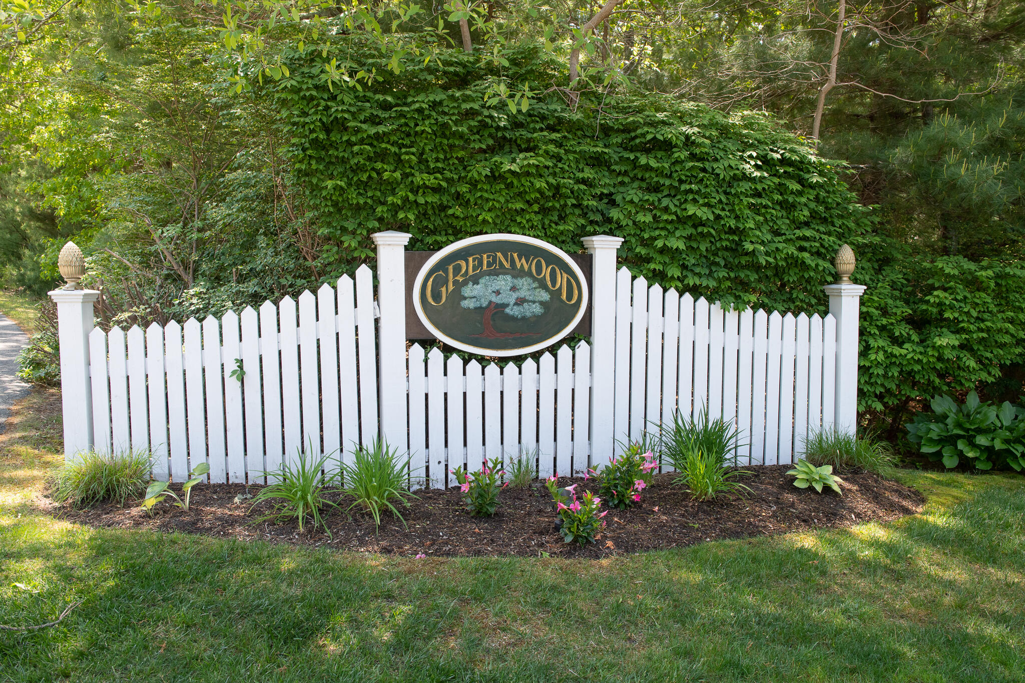 8 Yachtsman Circle Mashpee, MA 02649 - Photo 47 of 56 a view of a backyard with garden