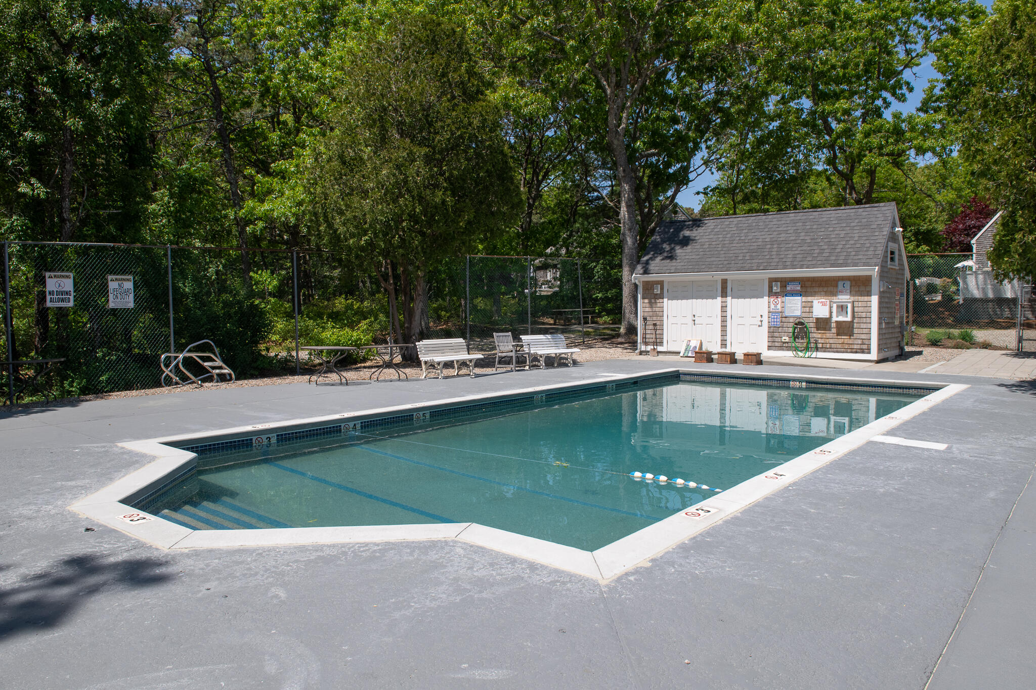 8 Yachtsman Circle Mashpee, MA 02649 - Photo 50 of 56 a view of a swimming pool with a patio