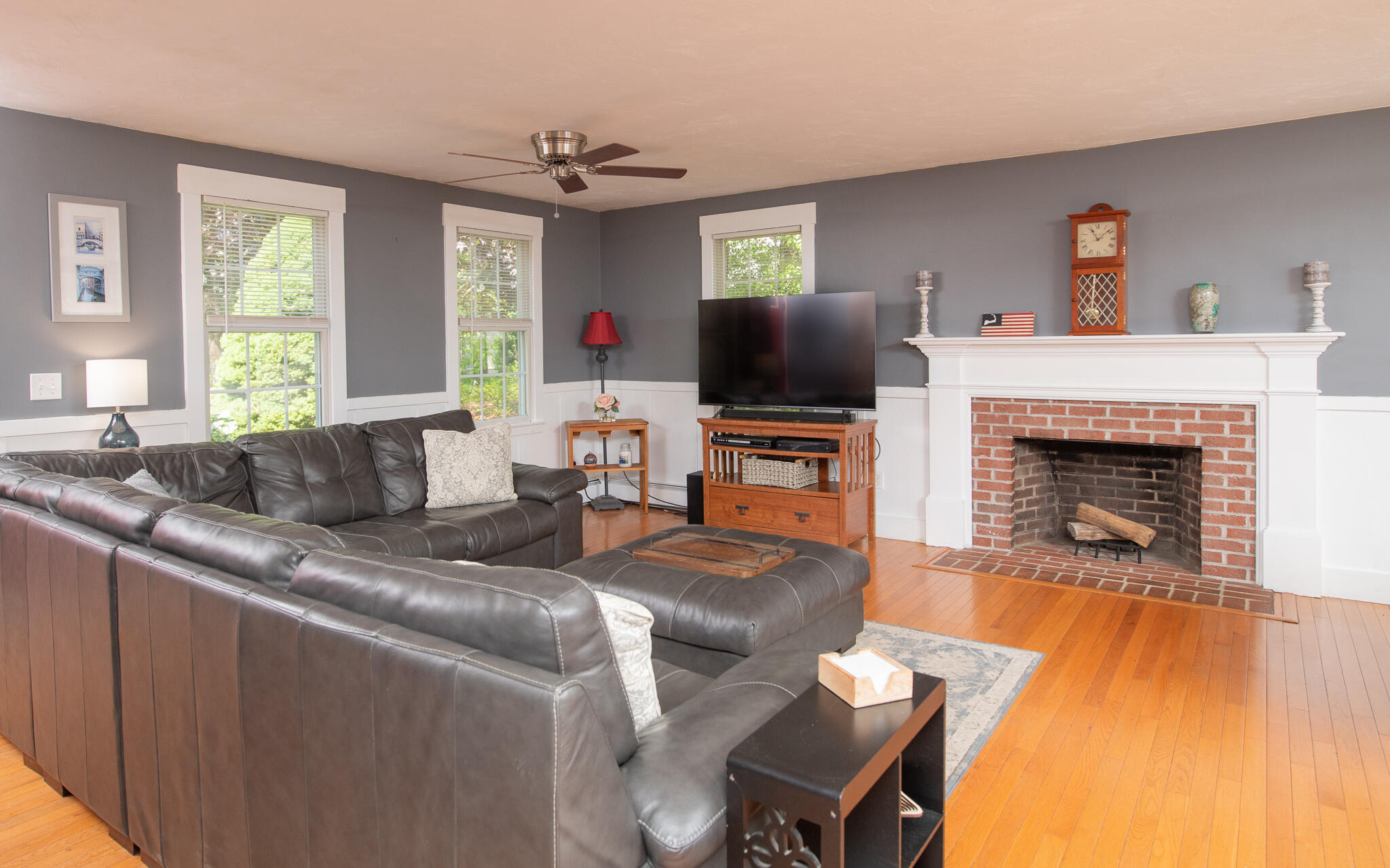 8 Yachtsman Circle Mashpee, MA 02649 - Photo 5 of 56 a living room with furniture a fireplace and a flat screen tv