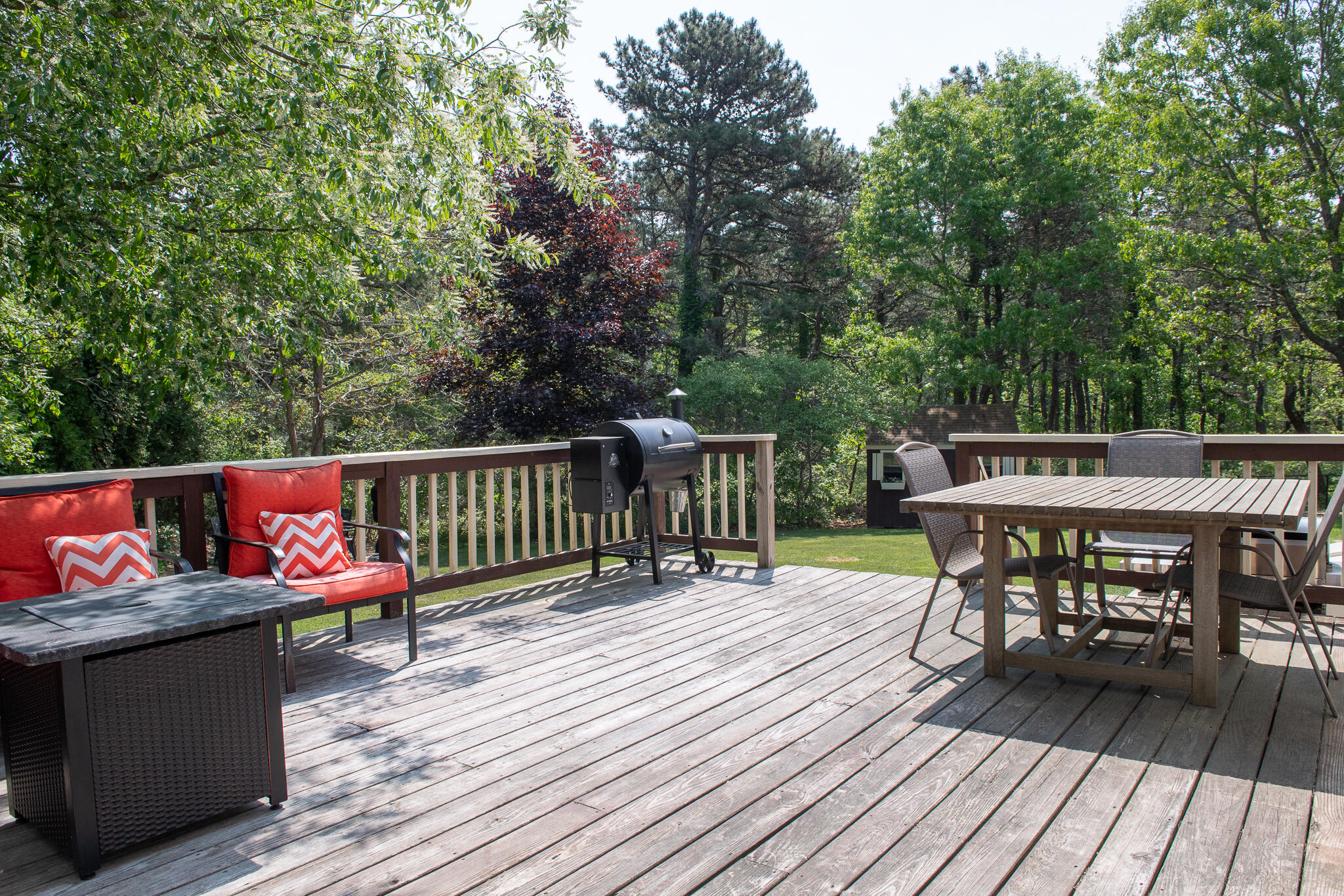 8 Yachtsman Circle Mashpee, MA 02649 - Photo 8 of 56 a view of a deck with wooden floor and outdoor seating
