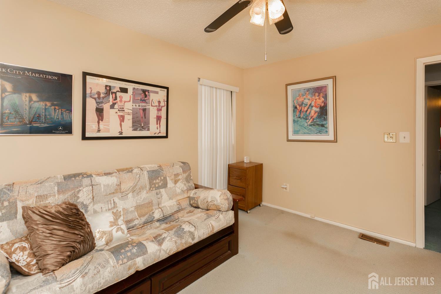 77 Linda Lane Edison, NJ 08820 - Photo 15 of 21 a living room with furniture and a white walls