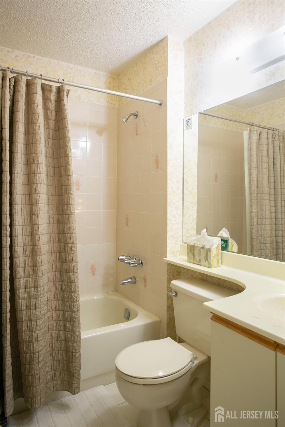 77 Linda Lane Edison, NJ 08820 - Photo 17 of 21 a bathroom with a sink toilet and shower