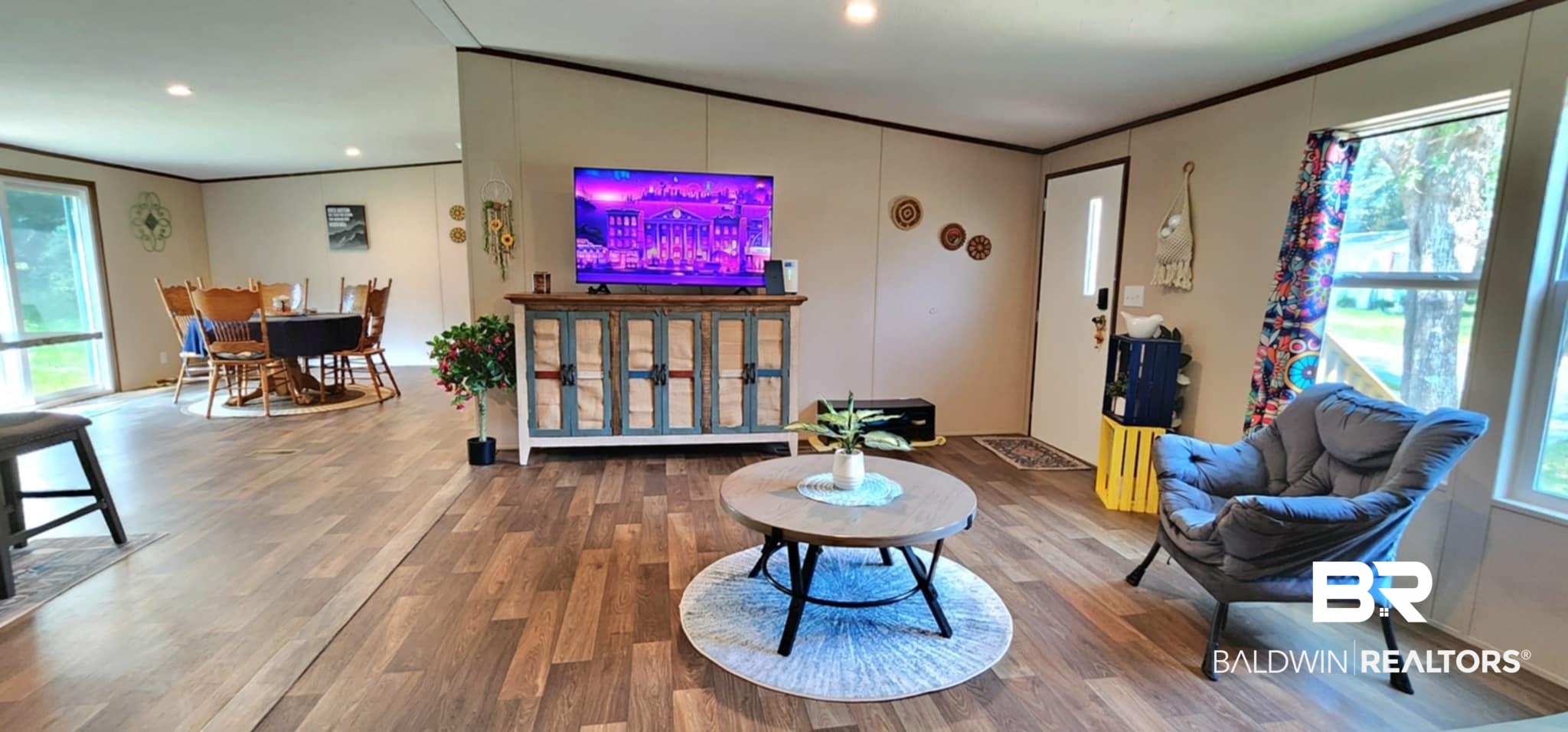 25474 Waterworld Road Robertsdale, AL 36567 - Photo 5 of 30 Living area with ornamental molding, wood finished floors, and recessed lighting