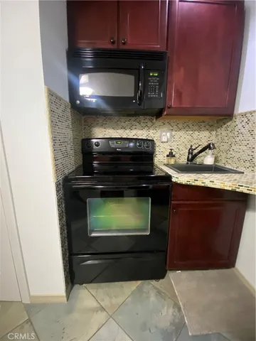 a close view of a sink and a stove