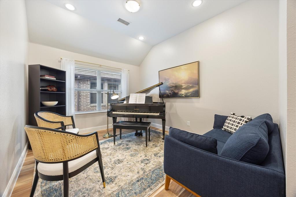 809 Mildren Lane Fate, TX 75087 - Photo 16 of 32 This is an extra room that would be ideal for an office, craft room, playroom or flex room. Make it your own!